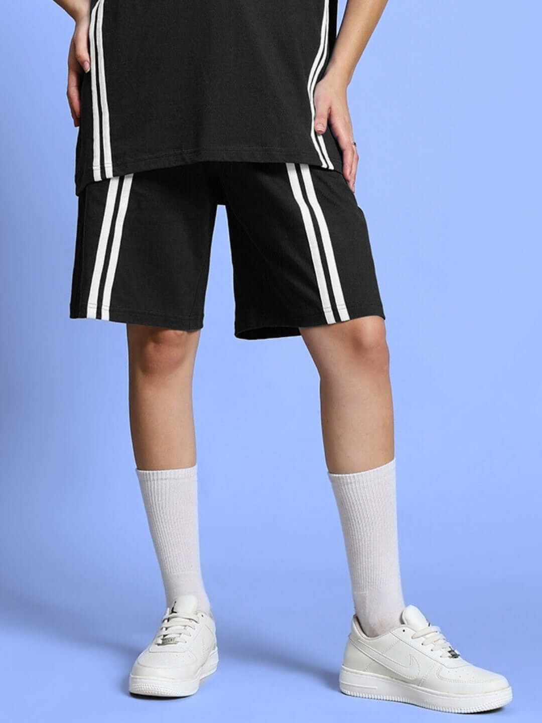 Women's black regular fit shorts with white stripes, featuring a customizable 'Custom Fit' option for personalized sizing.