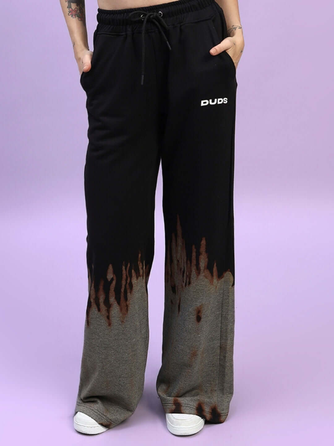 Women's black fire flame baggy tie-dye joggers by DUDS, featuring custom fit option and made-to-order craftsmanship.