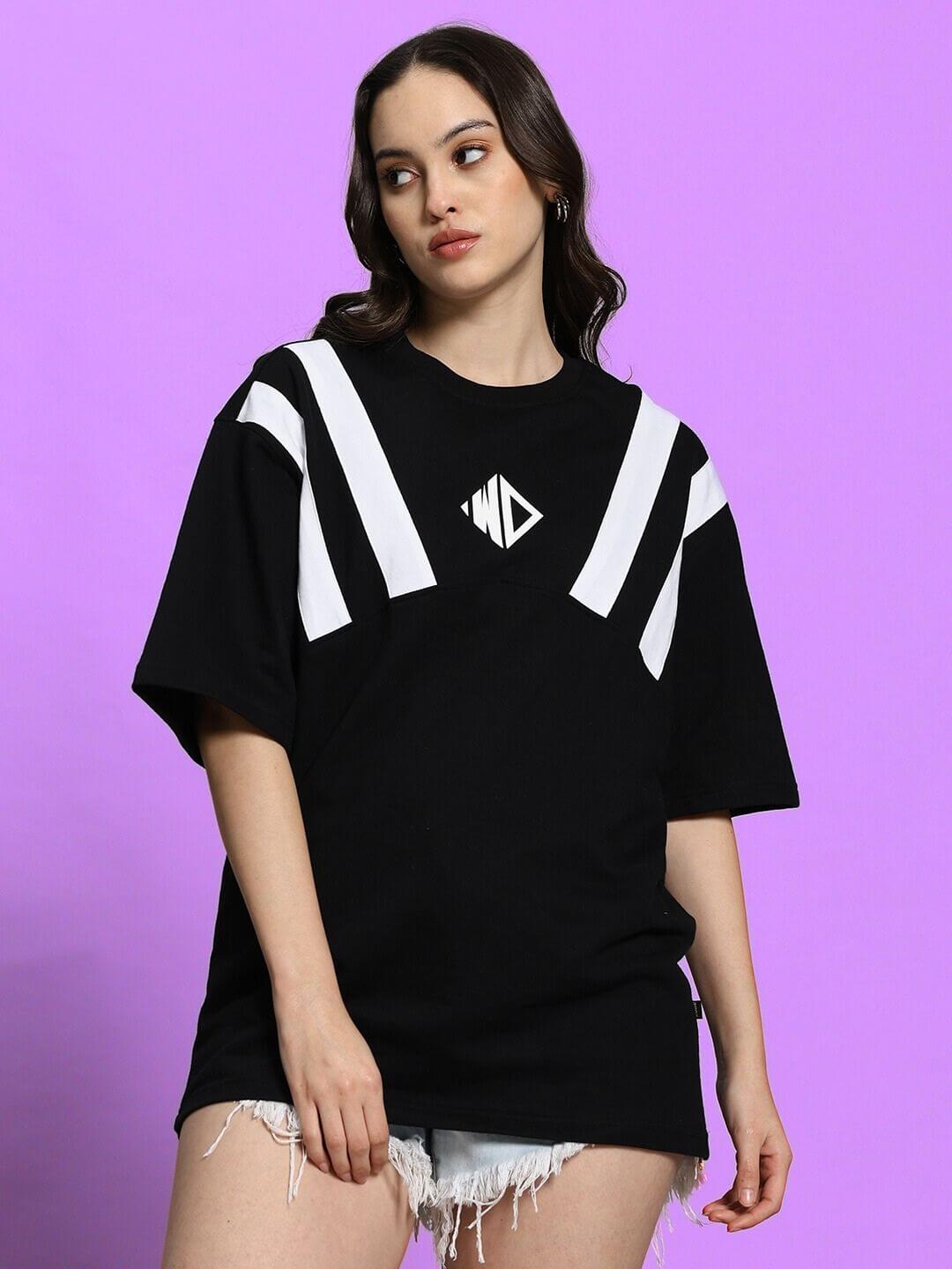 Model wearing Women's Allonzo oversized black t-shirt with white stripes, made from premium cotton blend.