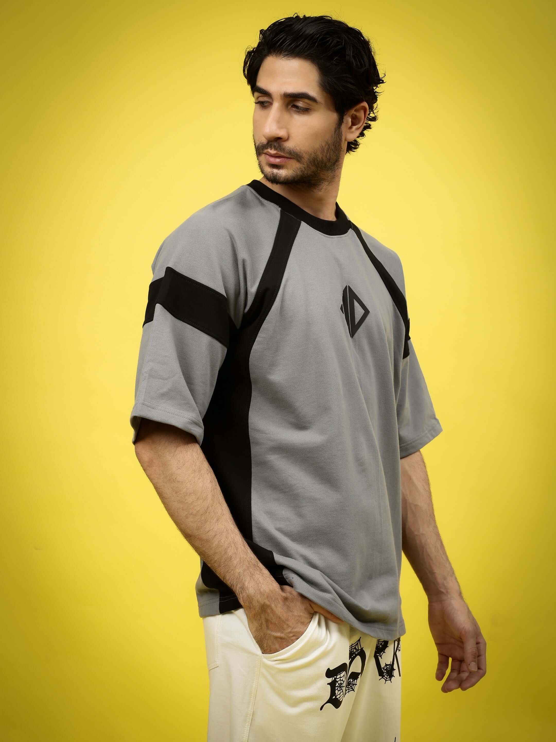 Model wearing TURBO OVER-SIZED T-SHIRT SLATE GREY made from premium heavy gauge fabric