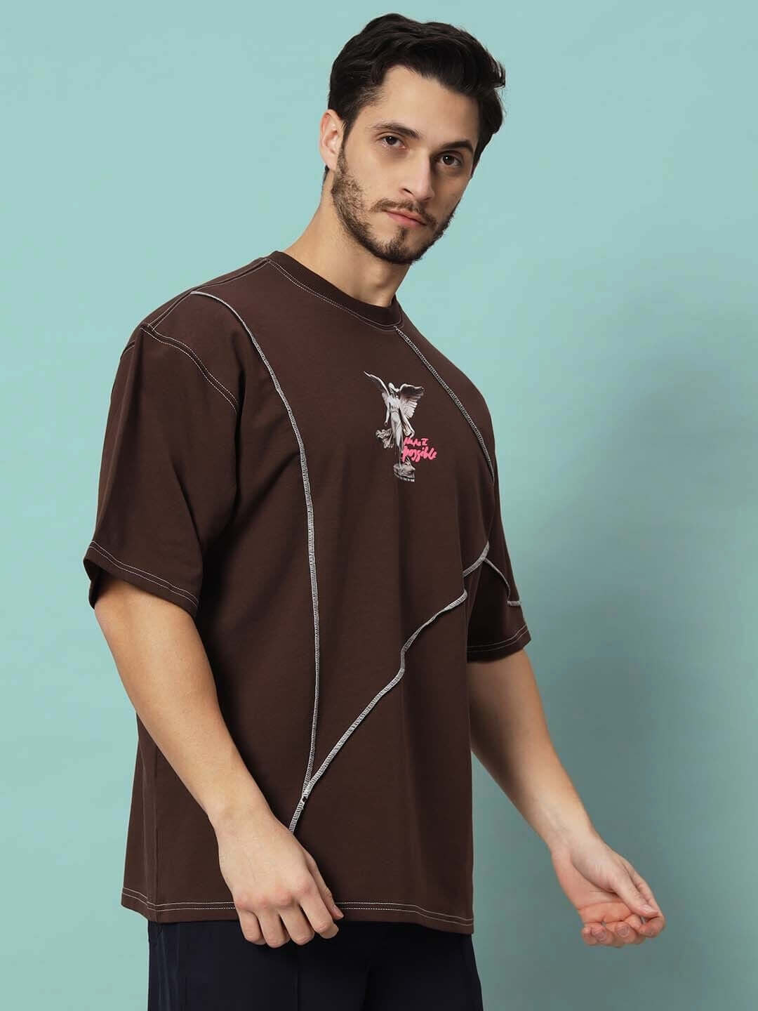 MAKE IT POSSIBLE CONTRAST STITCHED OVER-SIZED T-SHIRT BROWN with premium heavy gauge fabric and unique design, worn by model.