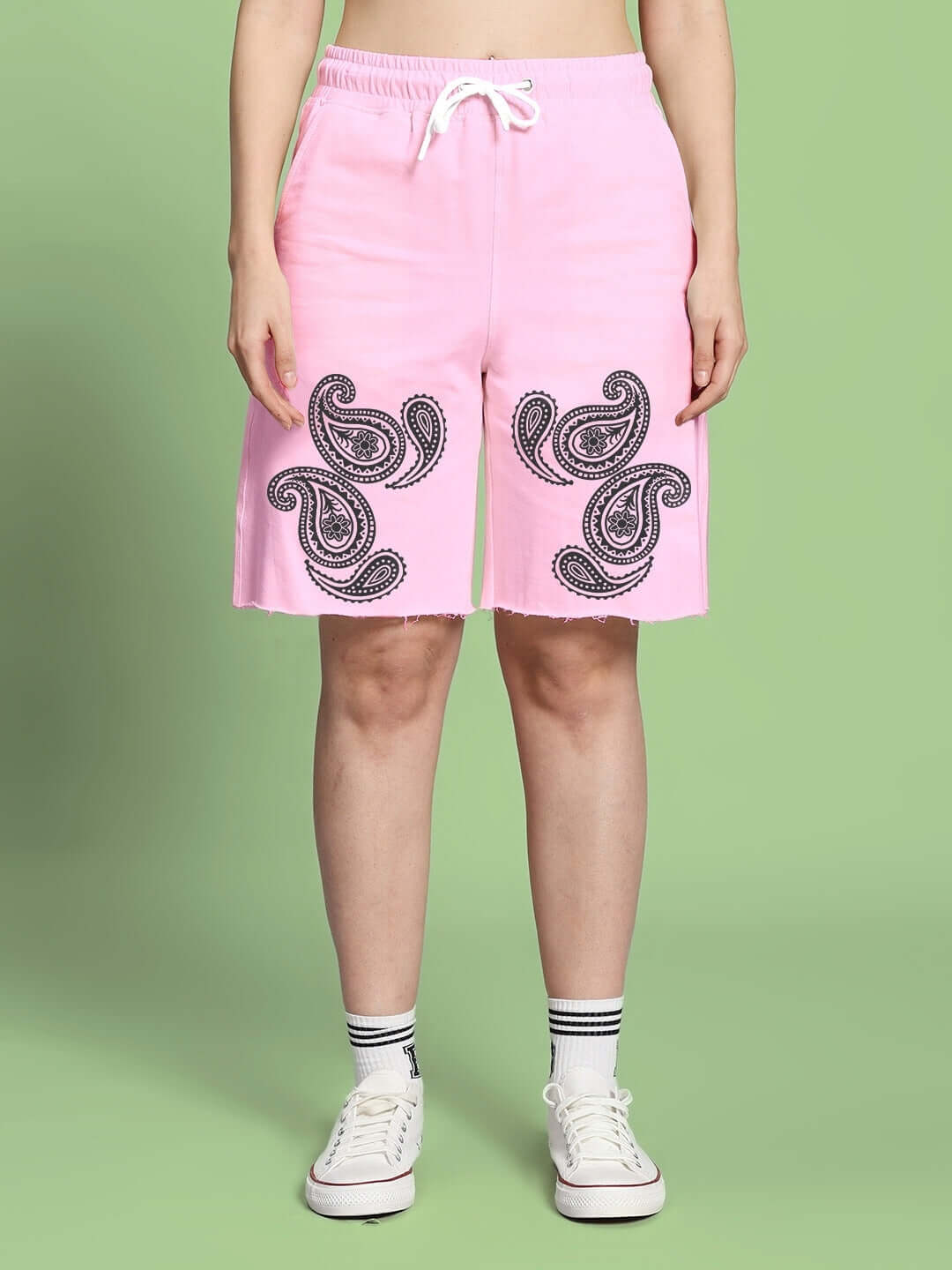 Women's pink shorts featuring a paisley print design, regular fit, with customizable size options, and handmade craftsmanship.