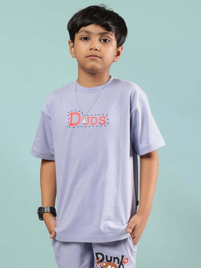 Child wearing lavender Duds Sammy T-shirt for boys and girls, custom fit available, perfect casual wear.