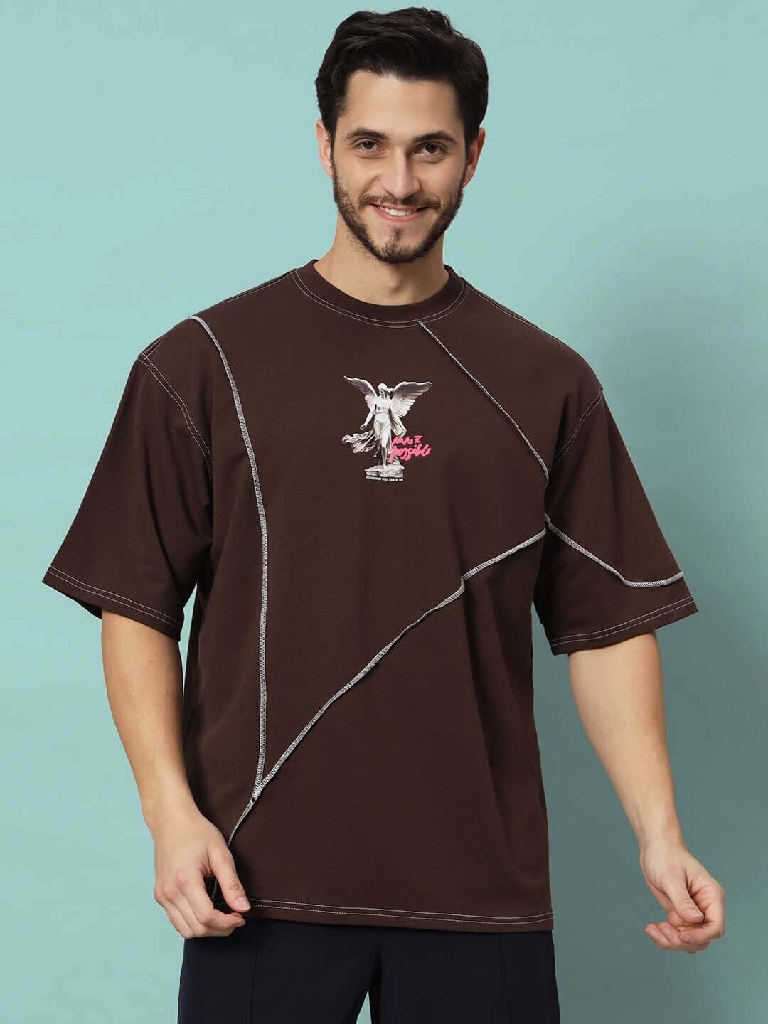 MAKE IT POSSIBLE CONTRAST STITCHED OVER-SIZED T-SHIRT BROWN made of premium heavy gauge fabric and 100% cotton worn by model.