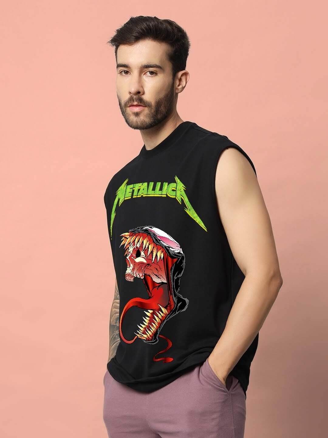 Man wearing Carnage gym t-shirt in black, featuring bold graphic design.