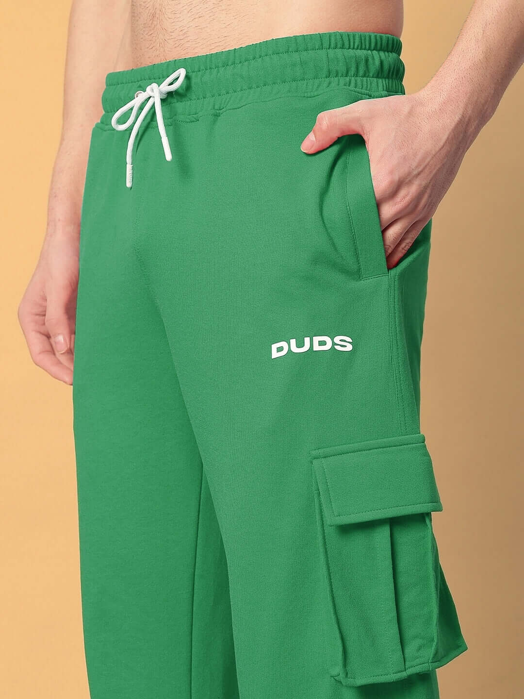 Green JESS 5 Pocket Relaxed Fit Joggers by DUDS, featuring a comfortable drawstring waist and side pockets.