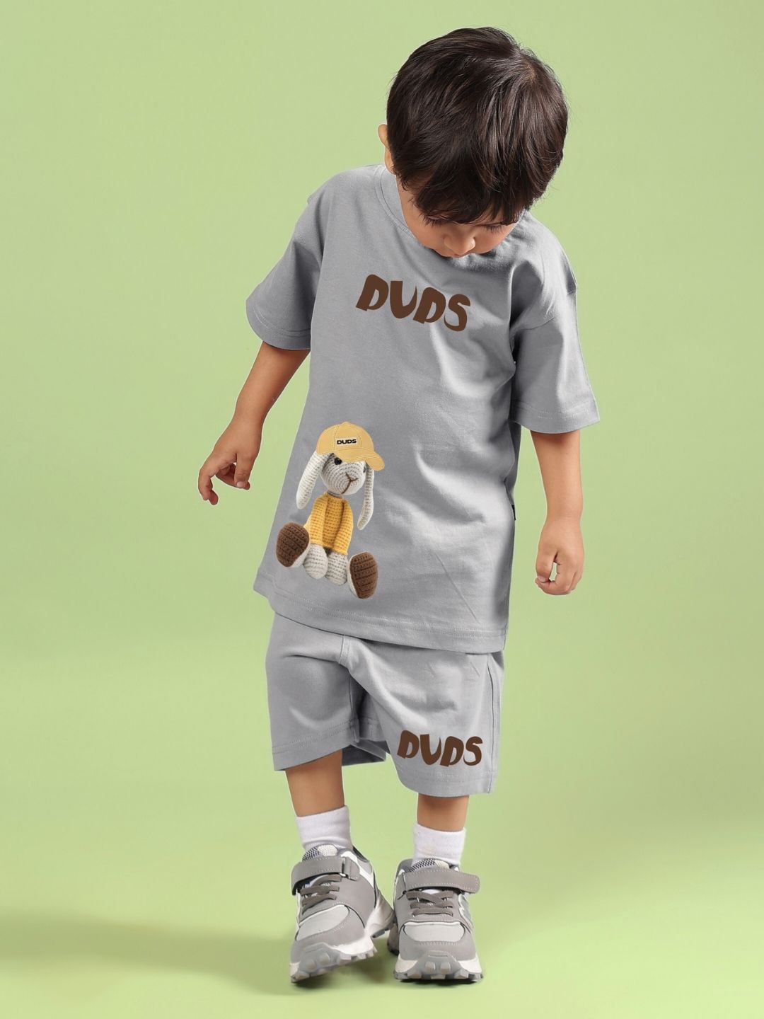 Child wearing grey Flint Bunny co-ord set, featuring bunny design, suitable for boys and girls, emphasizing unisex style and comfort.