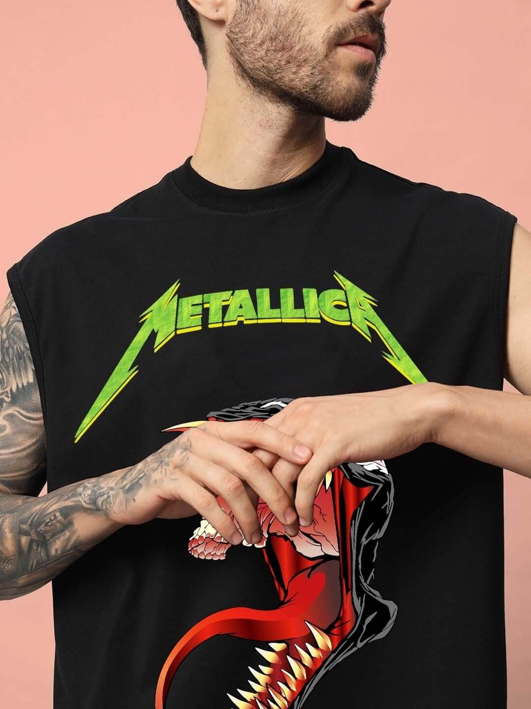 Man wearing black CARNAGE GYM T-shirt featuring vibrant graphics, ideal for fitness enthusiasts seeking customizable fit options.