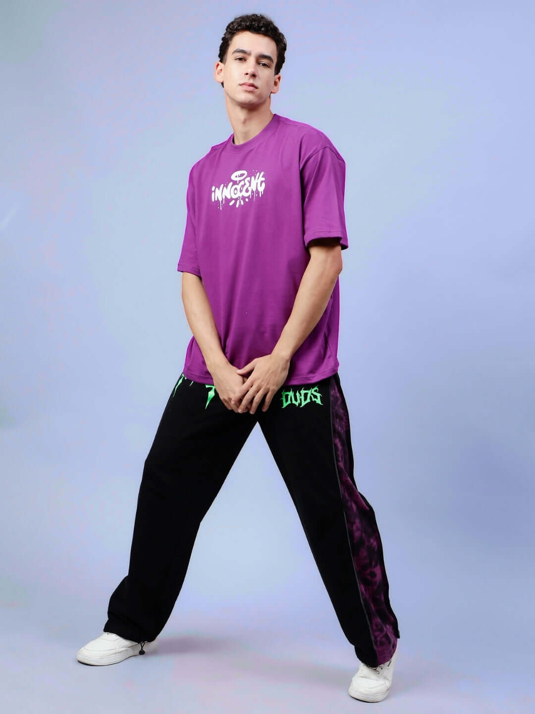 INNOCENT OVER-SIZED T-SHIRT PURPLE worn by model in casual pose