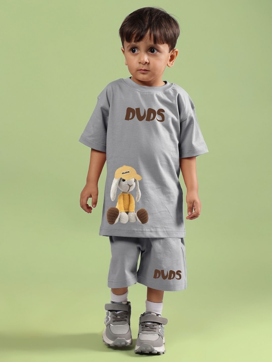 Child wearing grey unisex Flint Bunny co-ord set, featuring a cute bunny design, perfect for boys and girls. Stylish and comfortable outfit.