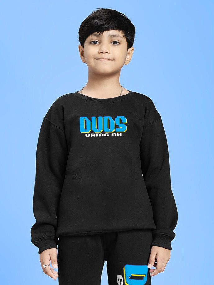 Child wearing GAME ON PRINT FLEECE SWEATSHIRT FOR BOYS GIRLS BLACK with sporty style and playful graphic design.