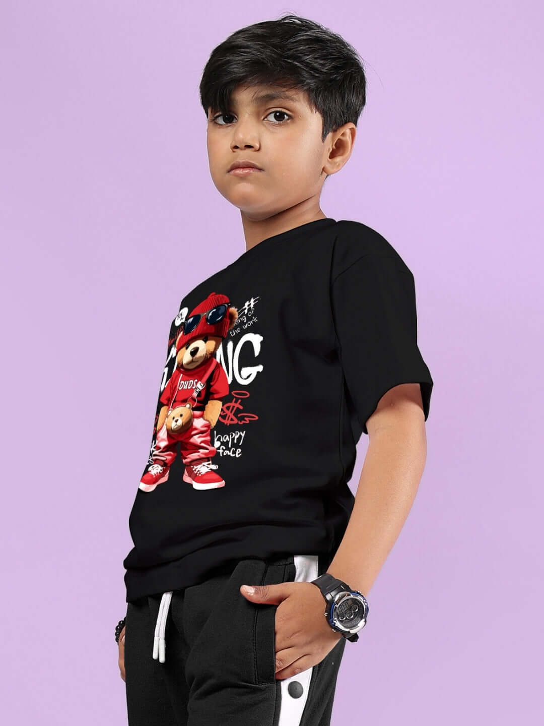 Child wearing a black hip hop teddy t-shirt with graphic design, suitable for boys and girls, available in custom fit and made to order by DUDS.
