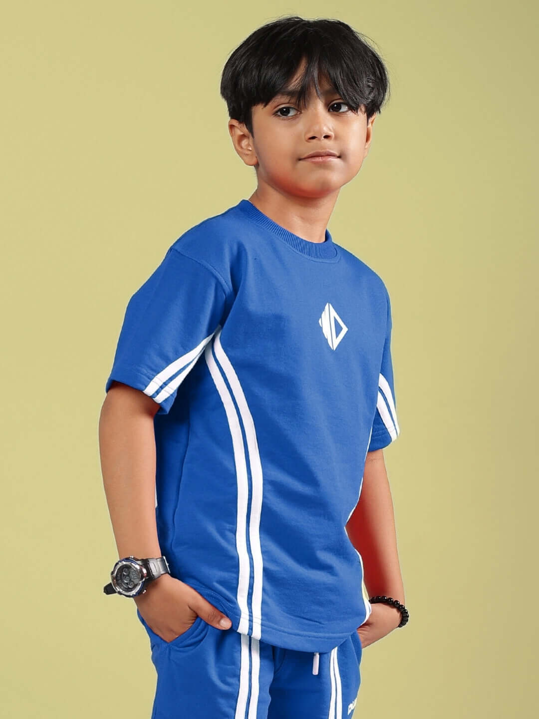 Child wearing blue unisex Outlook t-shirt with white stripes, made by DUDS, suitable for boys and girls, featuring a casual design.