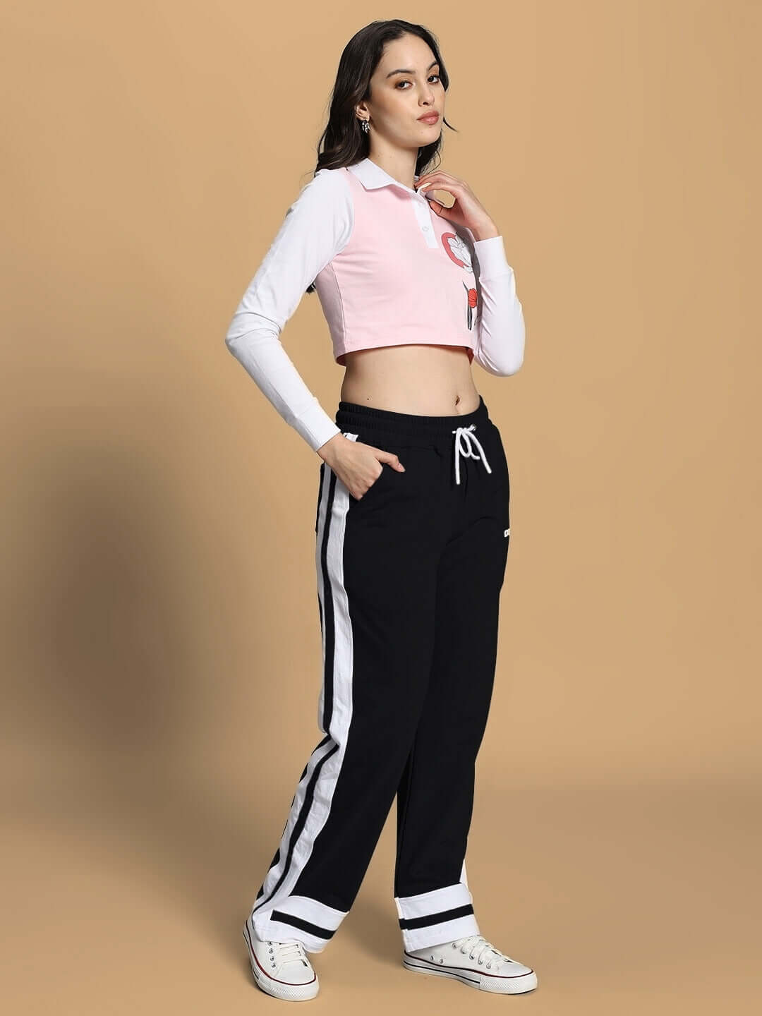 Model wearing WOMEN'S FLORA CO-ORD SET in pink and black, featuring premium cotton fabric with a sporty design and casual fit.