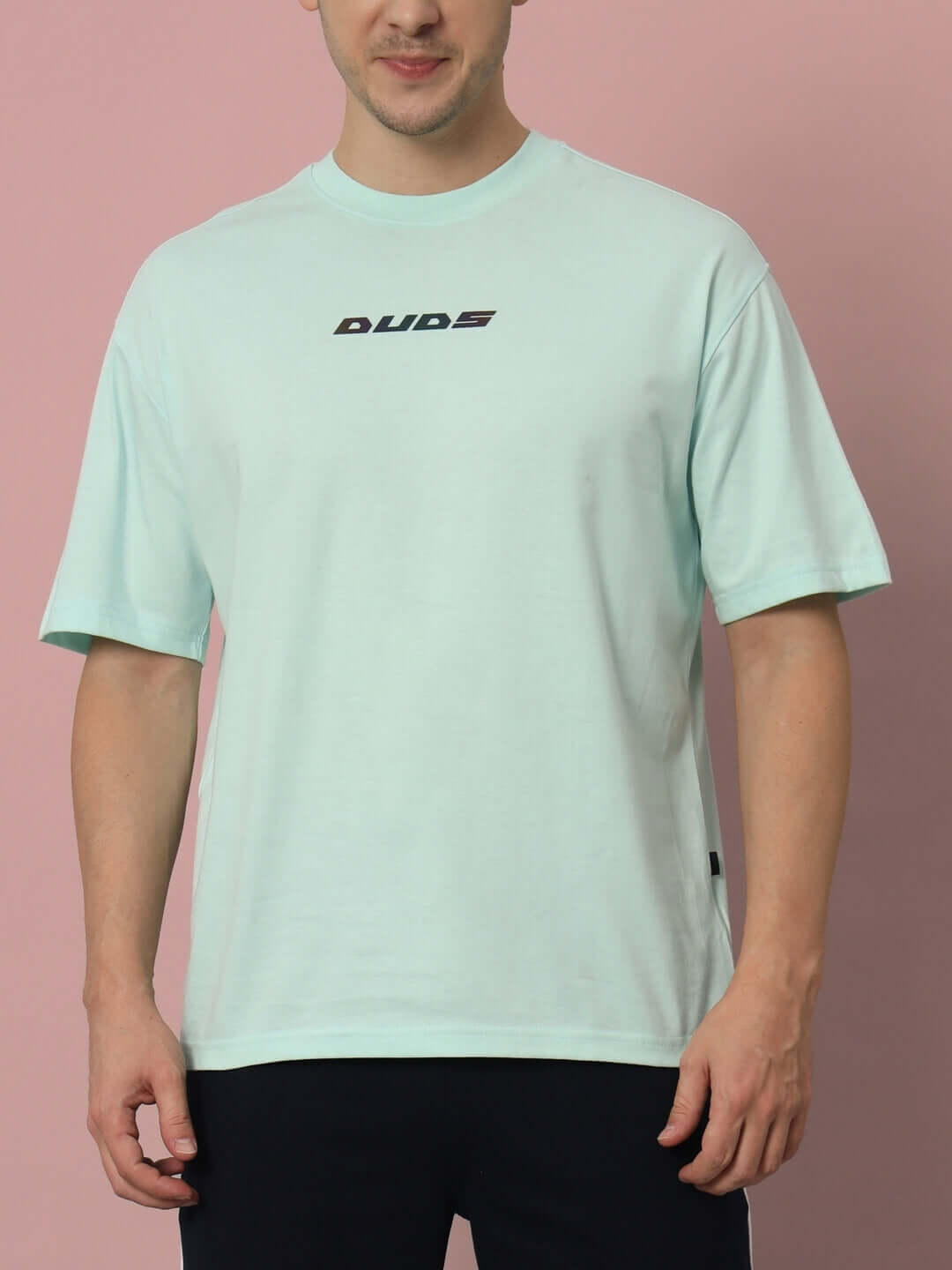 Model wearing LIVE GENTY UPON THIS EARTH OVER-SIZED T-SHIRT SKY BLUE, premium heavy gauge fabric, 100% cotton, bio-washed