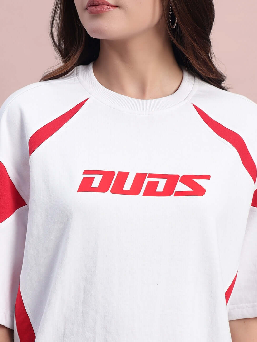 Women's oversized white and red t-shirt with logo, featuring premium cotton fabric and French terry material. Fashionable and comfortable.