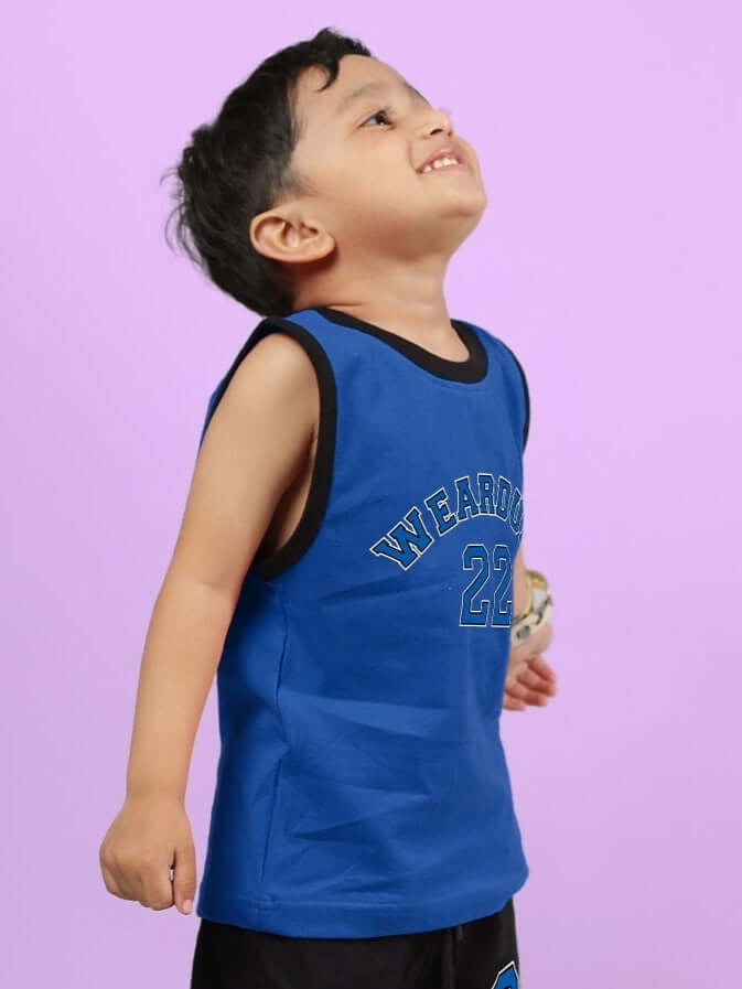 Child wearing AMIGA blue t-shirt for boys & girls, featuring sporty design and comfortable fit. Ideal for customization and made to order.