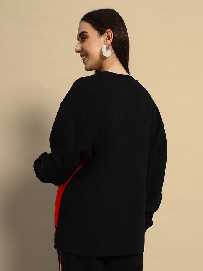 Woman wearing Women's WD Fireball Colorblock Co-ord in Black-Red, showcasing casual streetwear with bold colorblock design.