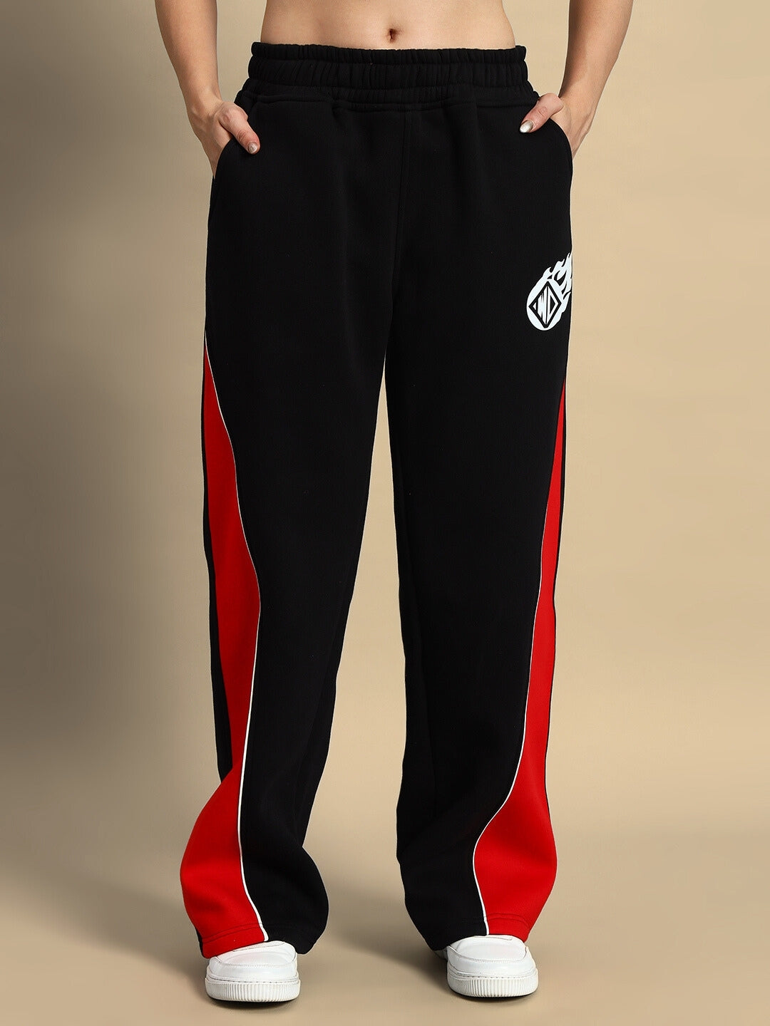Women's black and red colorblock pants, part of the WD Fireball Co-ord set, showcasing stylish streetwear fashion and comfort.