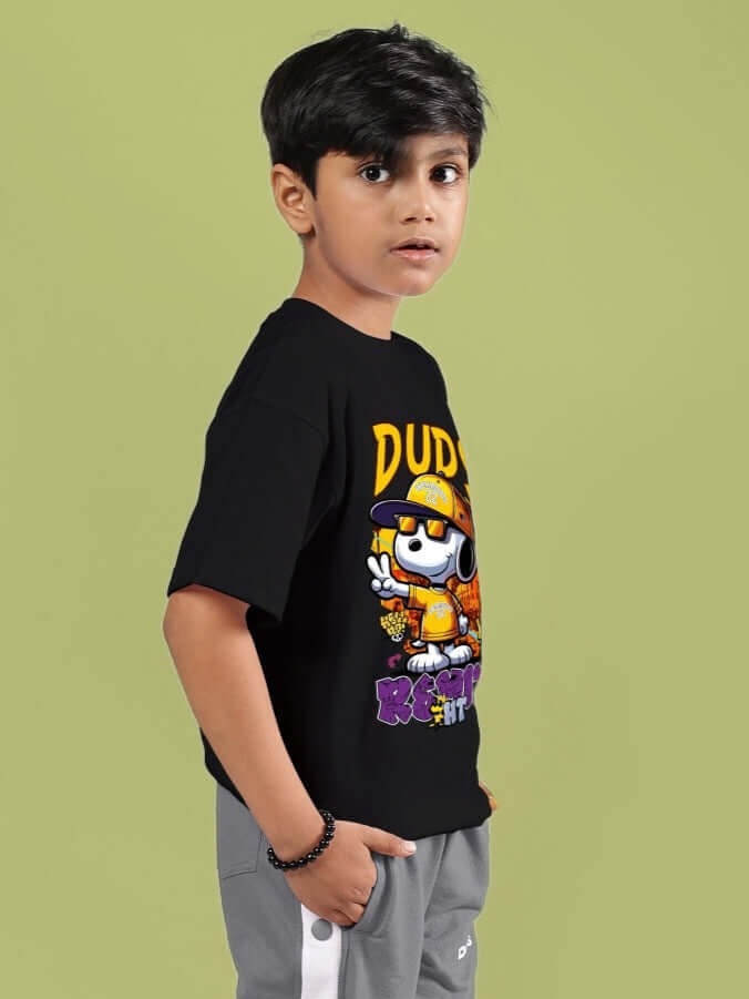 Boy wearing black Snoopy Rimix T-shirt by DUDS, suitable for boys and girls, customizable fit available.