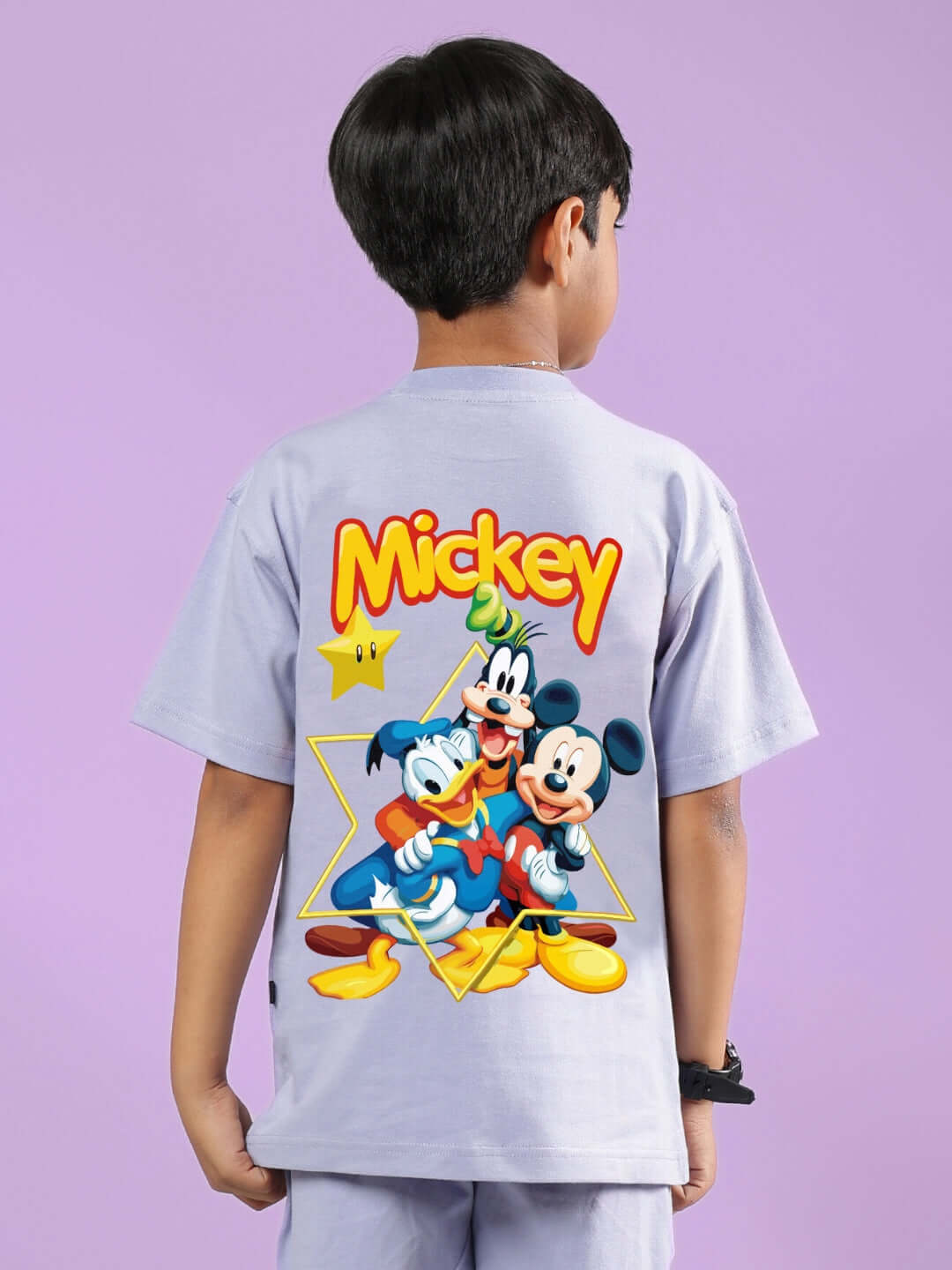 Boy wearing Mickey Dingo lavender t-shirt with colorful cartoon characters on back, ideal for kids, custom fit available.