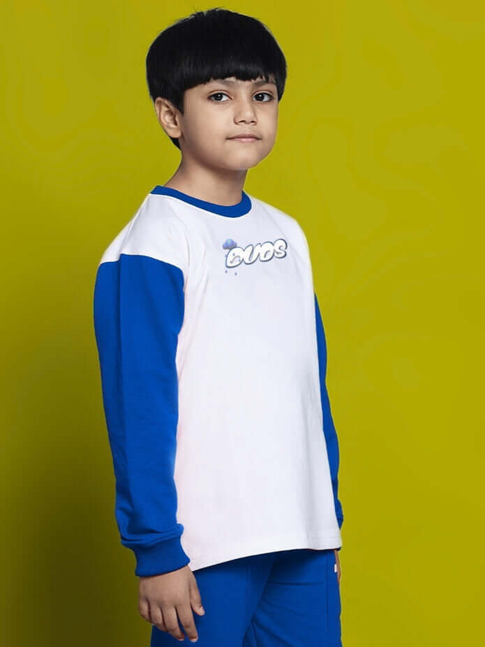 Child wearing white and blue Doraemon sweatshirt, made from premium cotton and elastane, designed for both boys and girls.