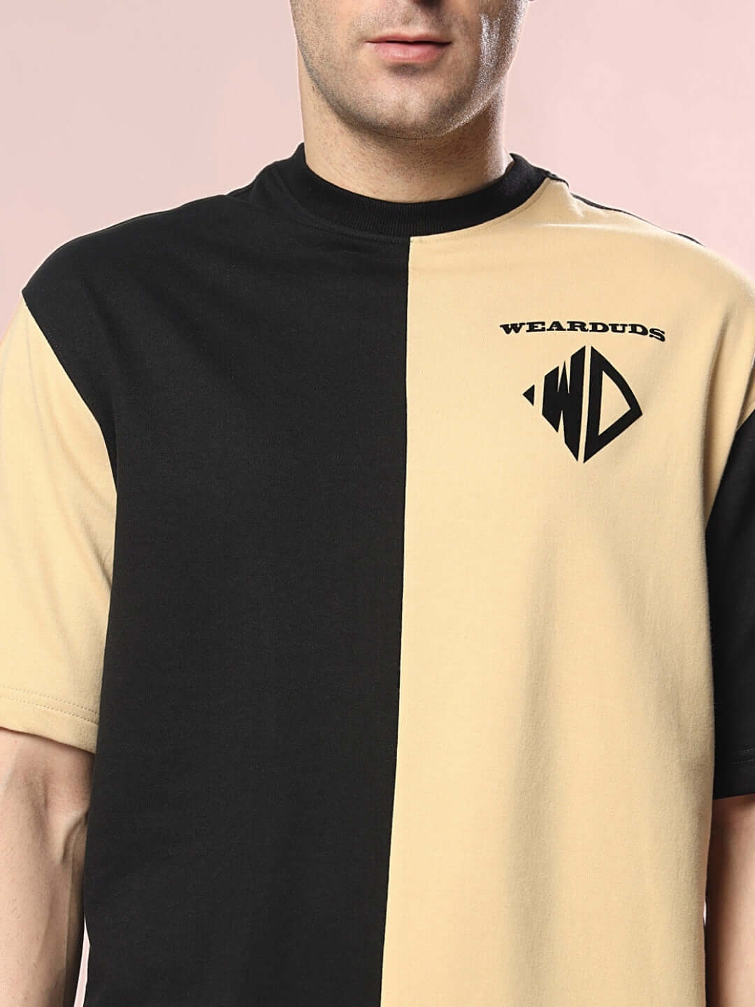 DRAGON OVERSIZED T-SHIRT BLACK BEIGE on model, featuring premium cotton fabric and unique two-tone design.