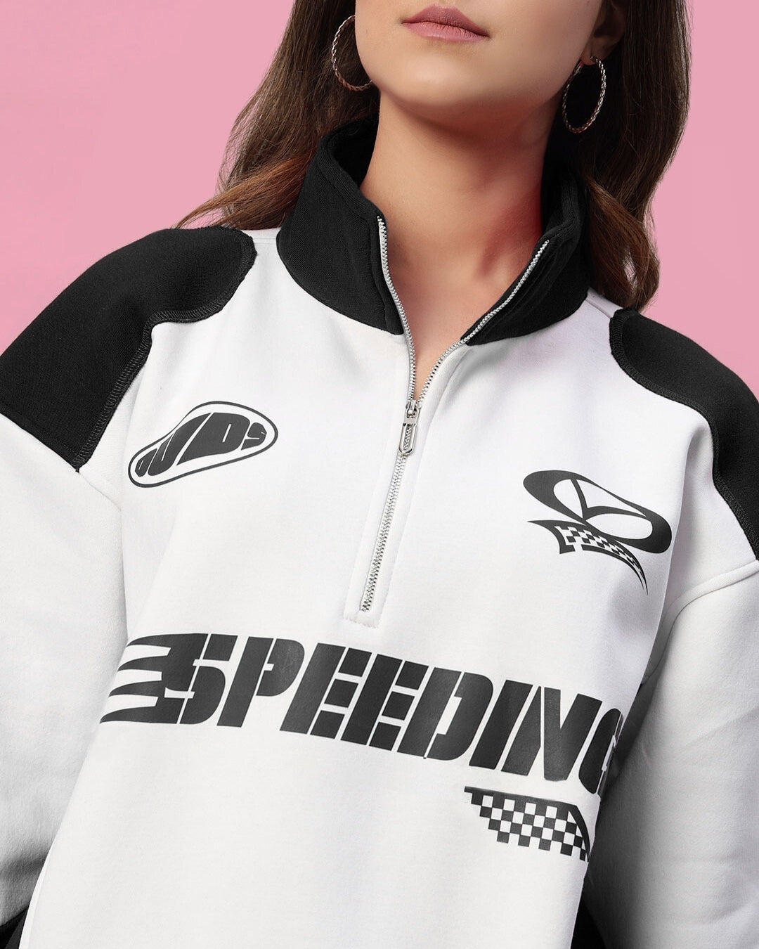 Women's black and white Speeding Colorblock Jacket with graphic details and zip-up collar, showcasing modern streetwear style.