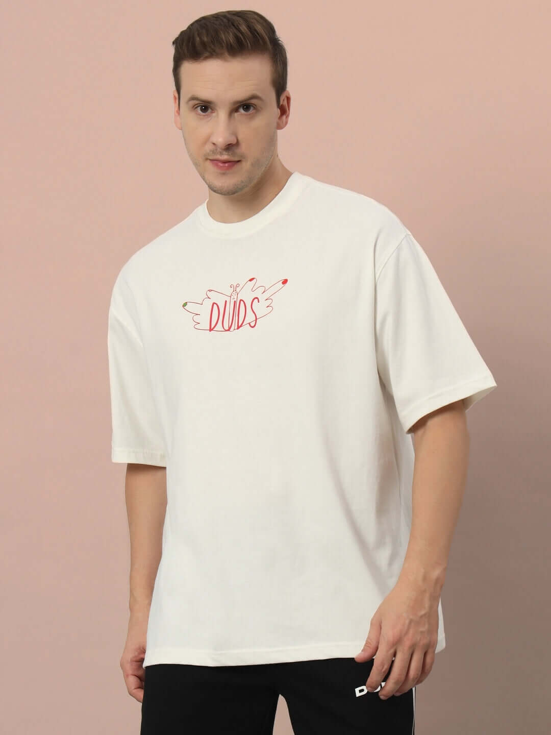 ONE STEP AT A TIME OVER-SIZED T-SHIRT OFF WHITE shown on model, premium heavy gauge fabric, 100% cotton, stylish casual wear