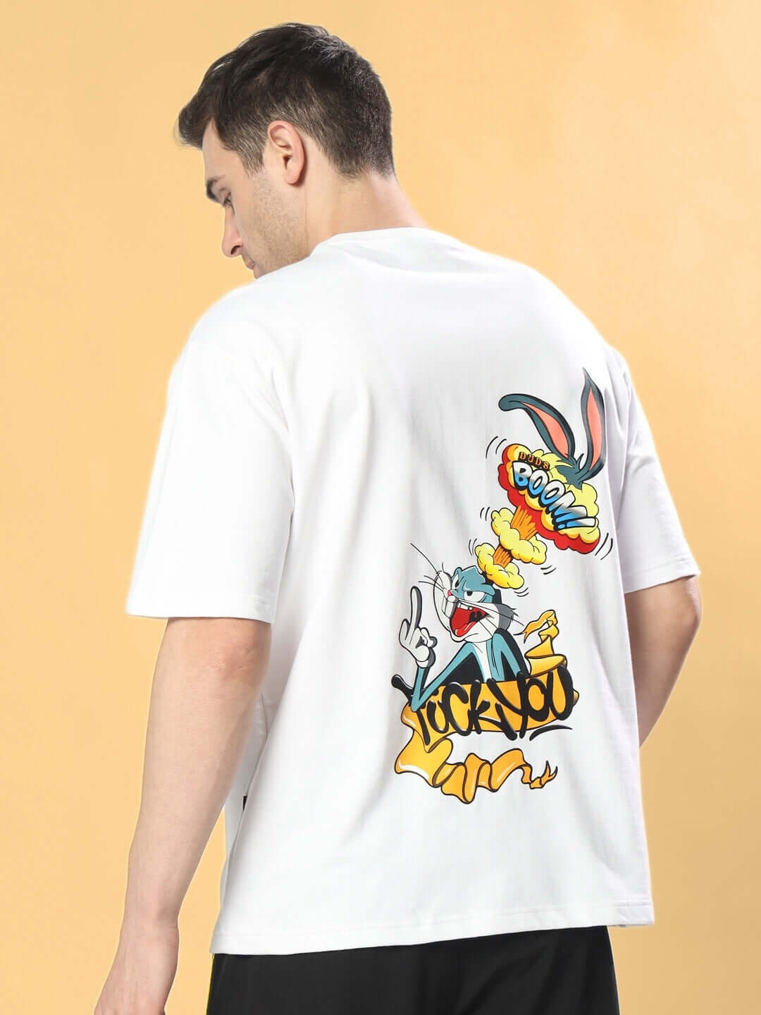 Back view of BOOM BUNNY OVER-SIZED T-SHIRT WHITE featuring a colorful cartoon design.
