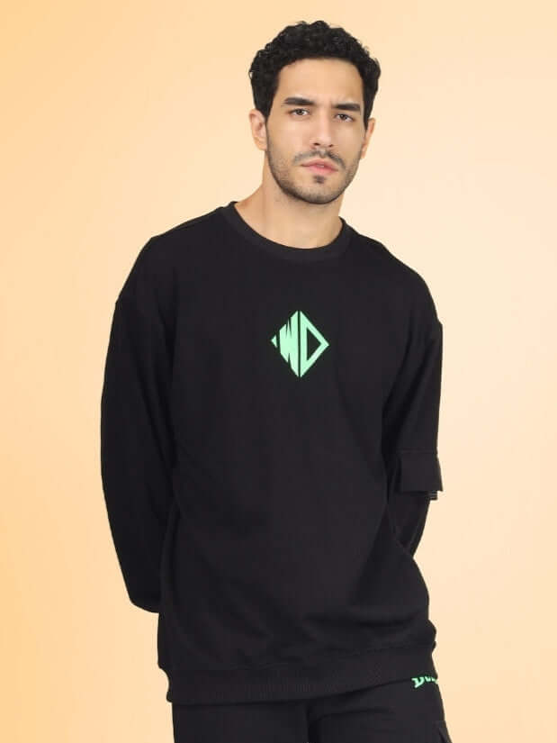 WD oversized black cotton terry sweatshirt modeled on person, featuring premium heavy gauge fabric with green logo, perfect for casual wear.