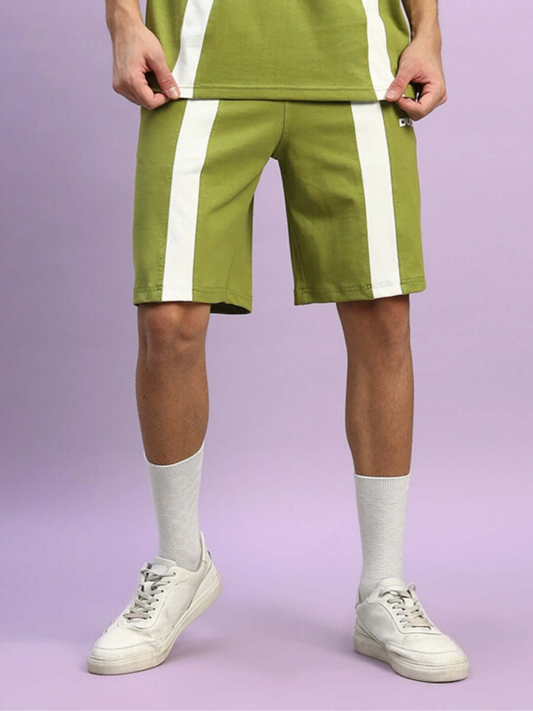 Wide-line regular fit olive green shorts with white stripes, shown on a model, available for customization.