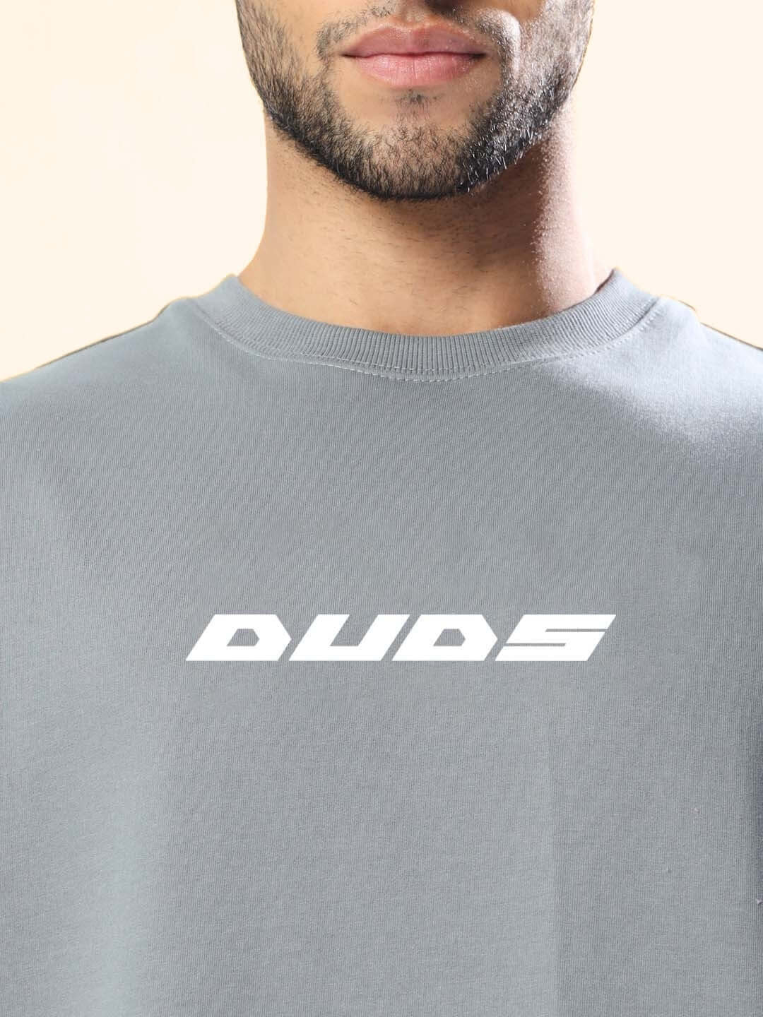 ONLY HOPE REMAINS OVER-SIZED T-SHIRT GREY featuring bold graphic on chest, showcasing modern streetwear style.
