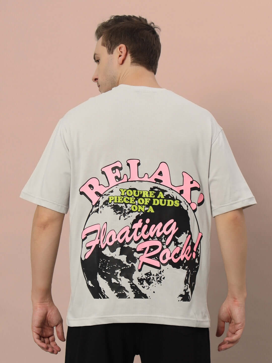 FLOATING ROCK OVER-SIZED T-SHIRT GREY with graphic design on back, 100% cotton, premium heavy gauge fabric, worn by male model.