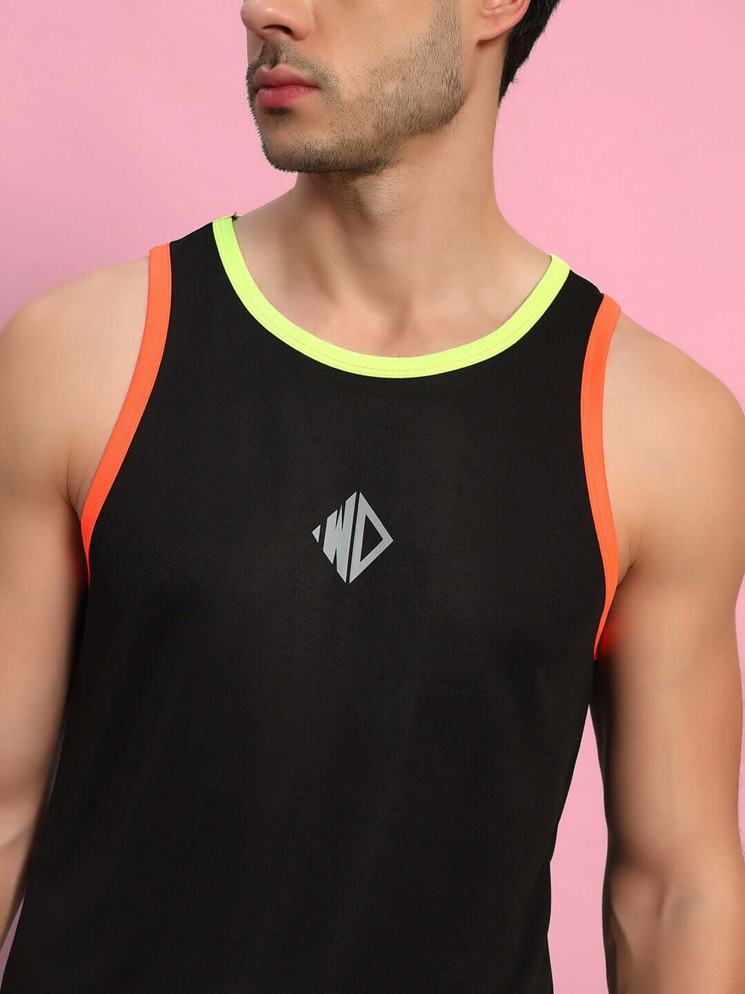 Model wearing black Jordan gym co-ord set with neon trims, highlighting sports polyester fabric. Cold wash care. Made in India.