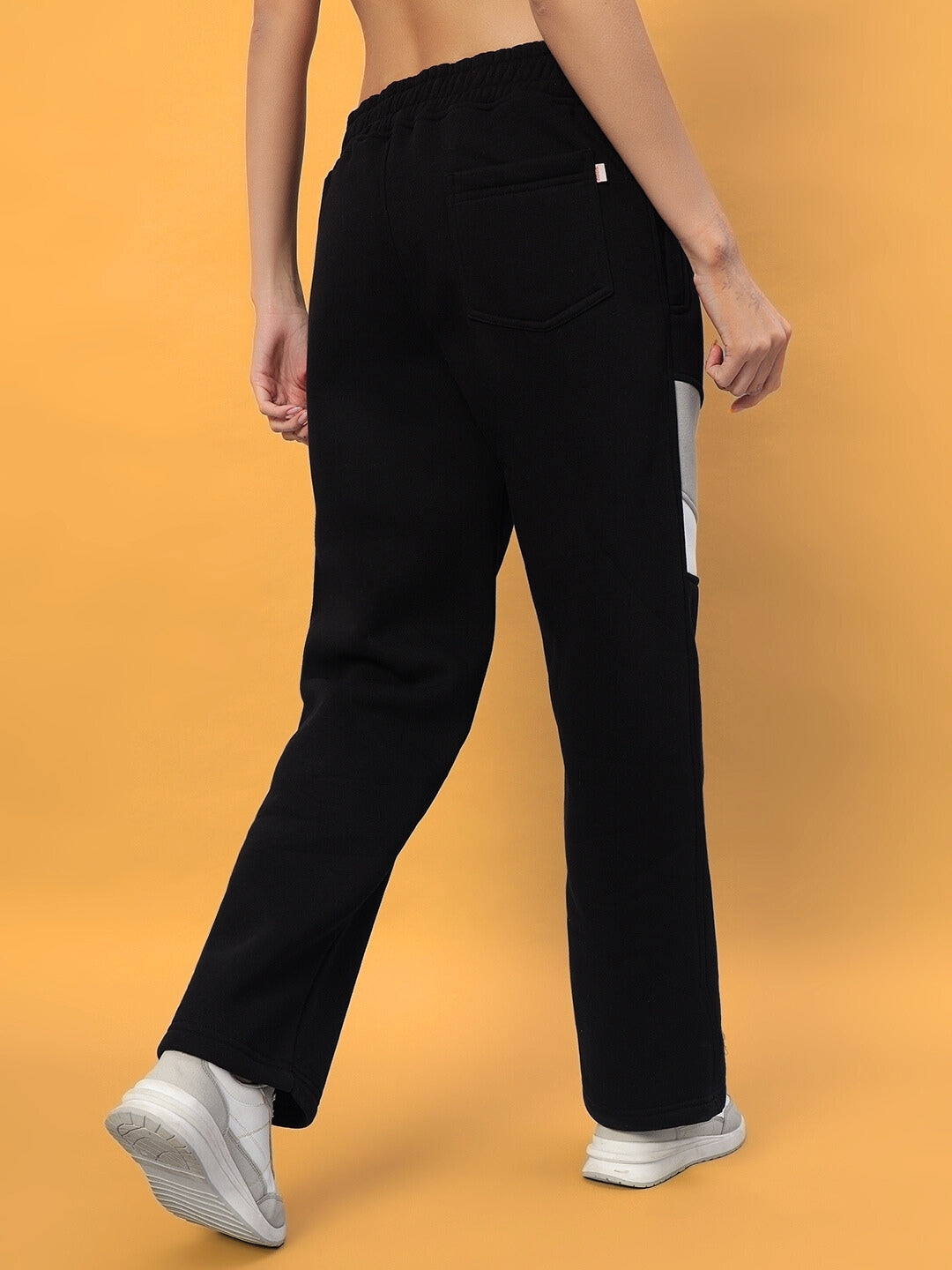 Back view of Women's Aviator Fleece Colorblock Co-ord Set in black, showcasing cozy fleece and modern design, perfect for casual wear.