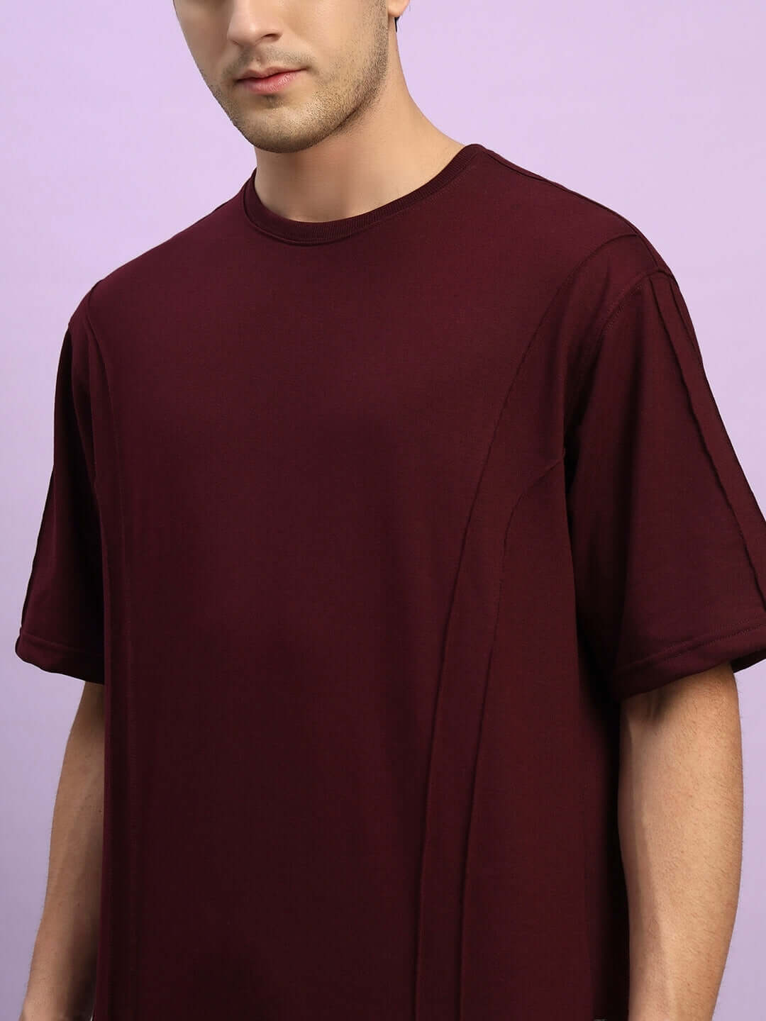 ZION maroon relaxed fit t-shirt shown on a model, made from 100% premium cotton with a bio-washed finish for comfort and style.