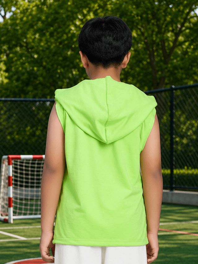 CURIOUS CAT HOODED T-SHIRT FOR BOYS GIRLS NEON GREEN worn by a child from the back on a soccer field.
