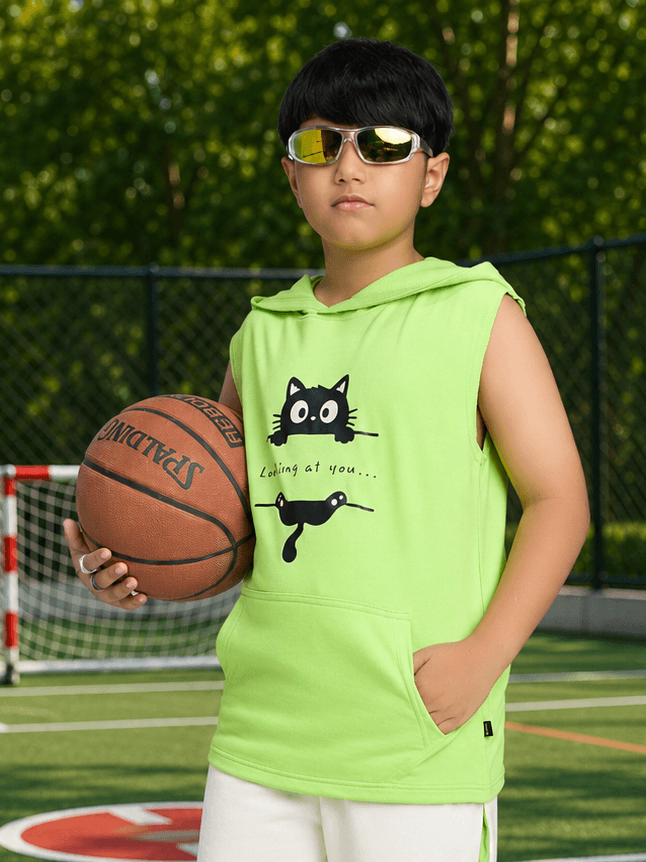 CURIOUS CAT HOODED T-SHIRT FOR BOYS GIRLS NEON GREEN worn by a boy holding a basketball on a court.