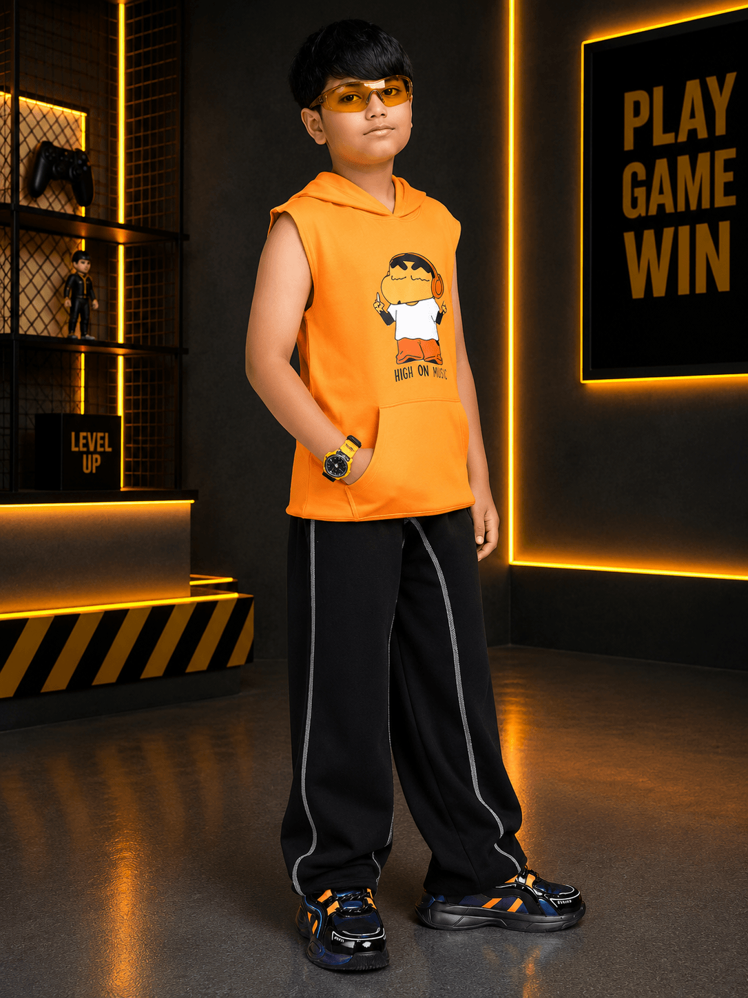 BEAT MODE HOODED CO-ORD FOR BOYS GIRLS ORANGE BLACK worn by a boy with sunglasses in a gaming-themed setup.