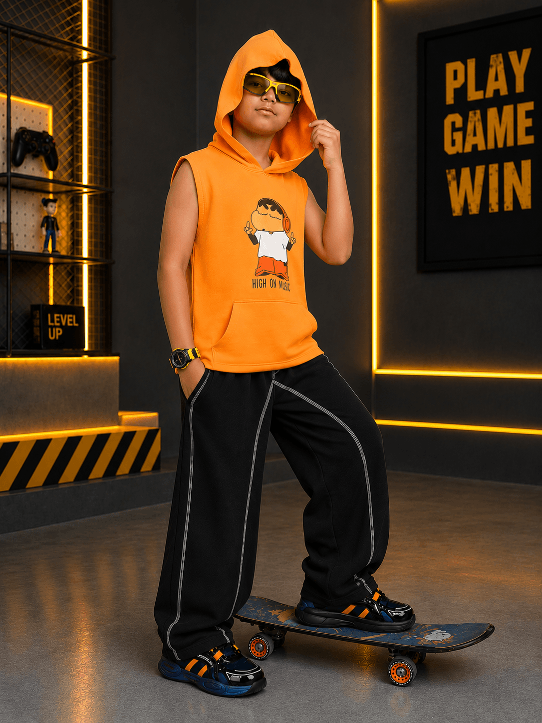 BEAT MODE HOODED CO-ORD FOR BOYS GIRLS ORANGE BLACK style showcased by a boy on a skateboard in an urban setting.