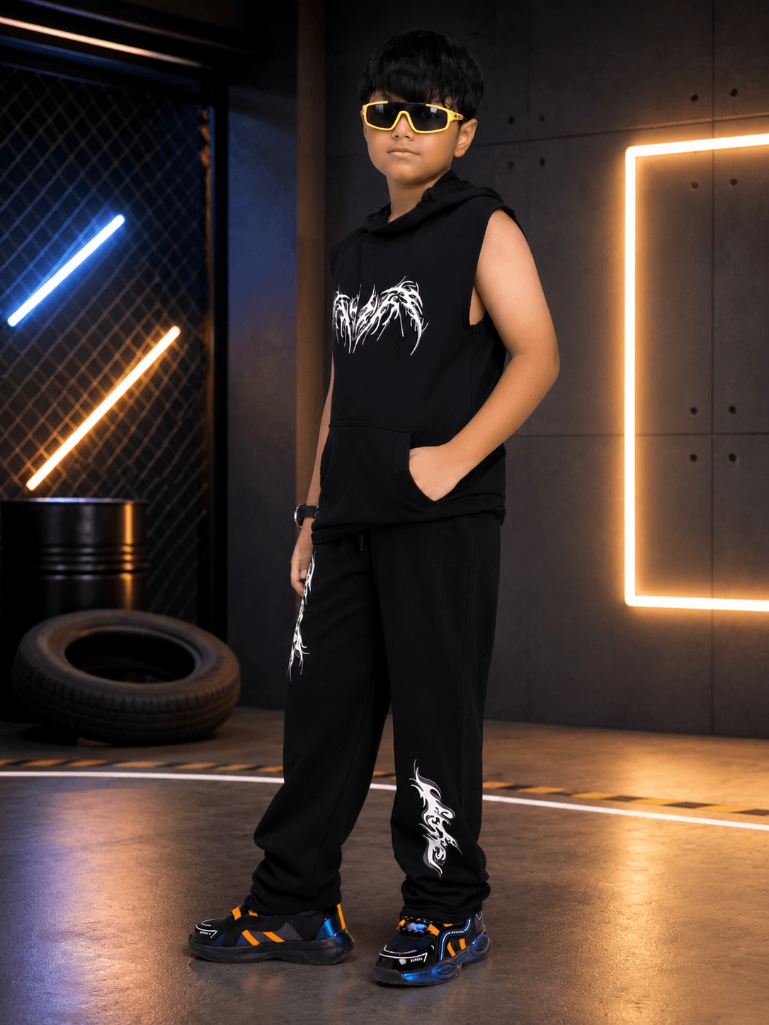 PHANTOM SLEEVELESS HOODED CO-ORD FOR BOYS GIRLS BLACK worn by a child in trendy streetwear style.
