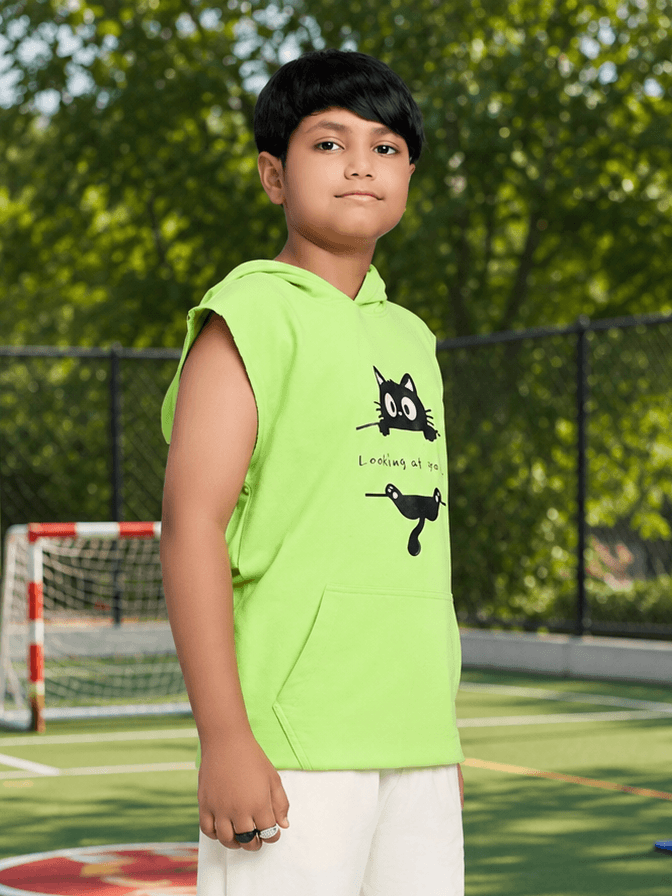 CURIOUS CAT HOODED T-SHIRT FOR BOYS GIRLS NEON GREEN worn by a boy in a vibrant outdoor setting.