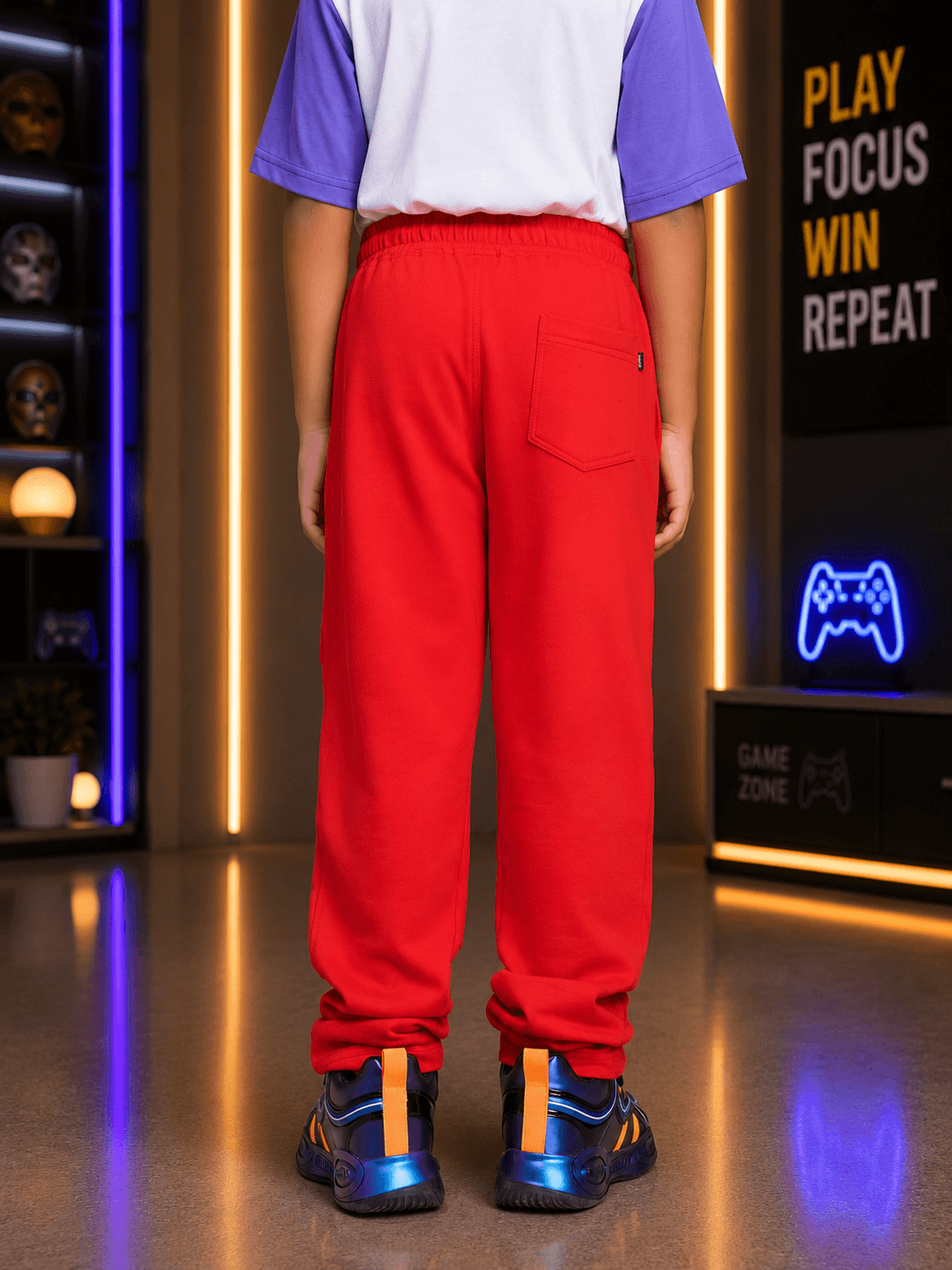 AWESOME FLAP POCKET BAGGY JOGGER FOR BOYS GIRLS RED displayed from behind, showcasing the relaxed fit and flap pocket details.