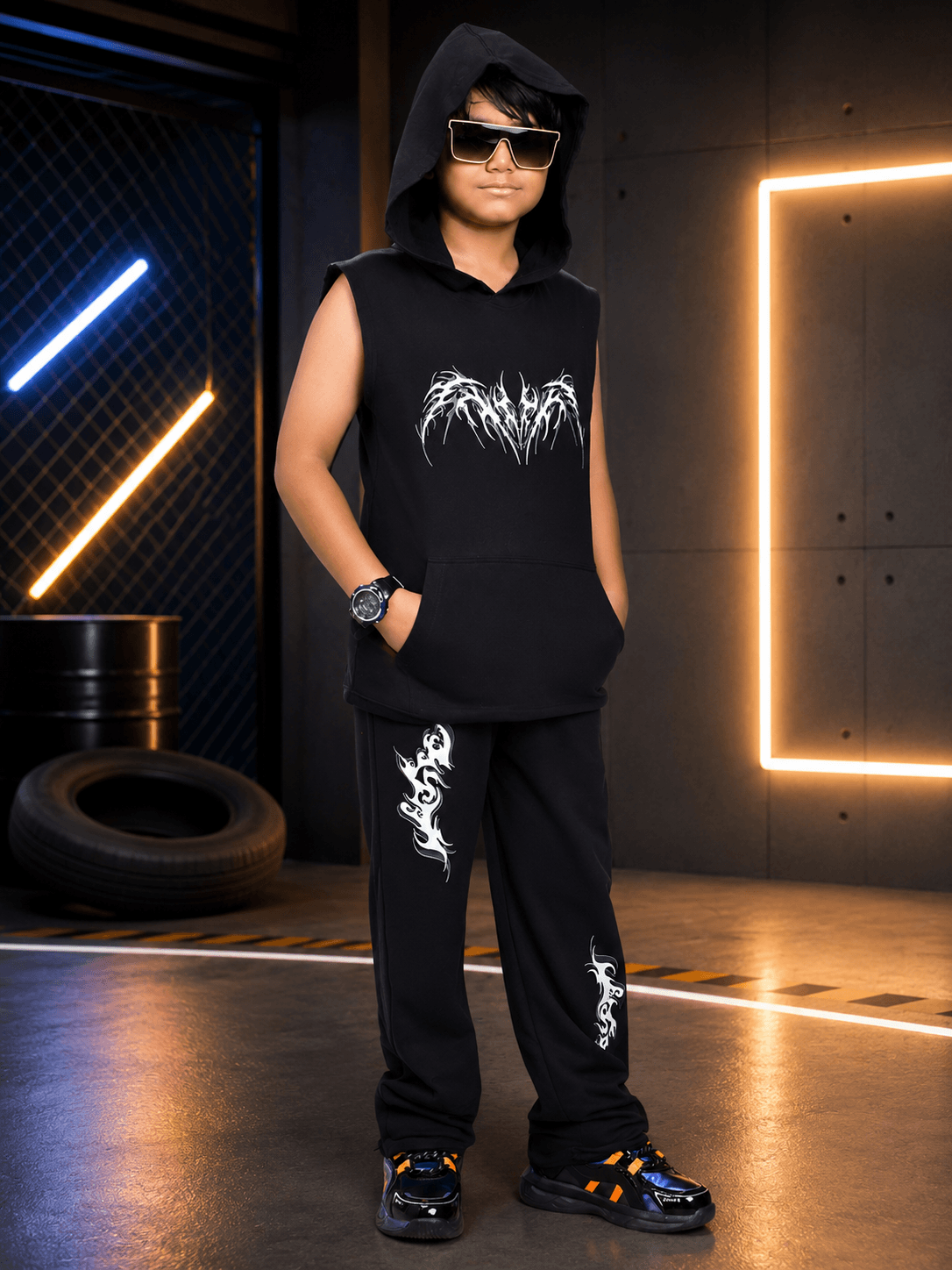 PHANTOM SLEEVELESS HOODED CO-ORD FOR BOYS GIRLS BLACK worn by child in stylish urban setting.