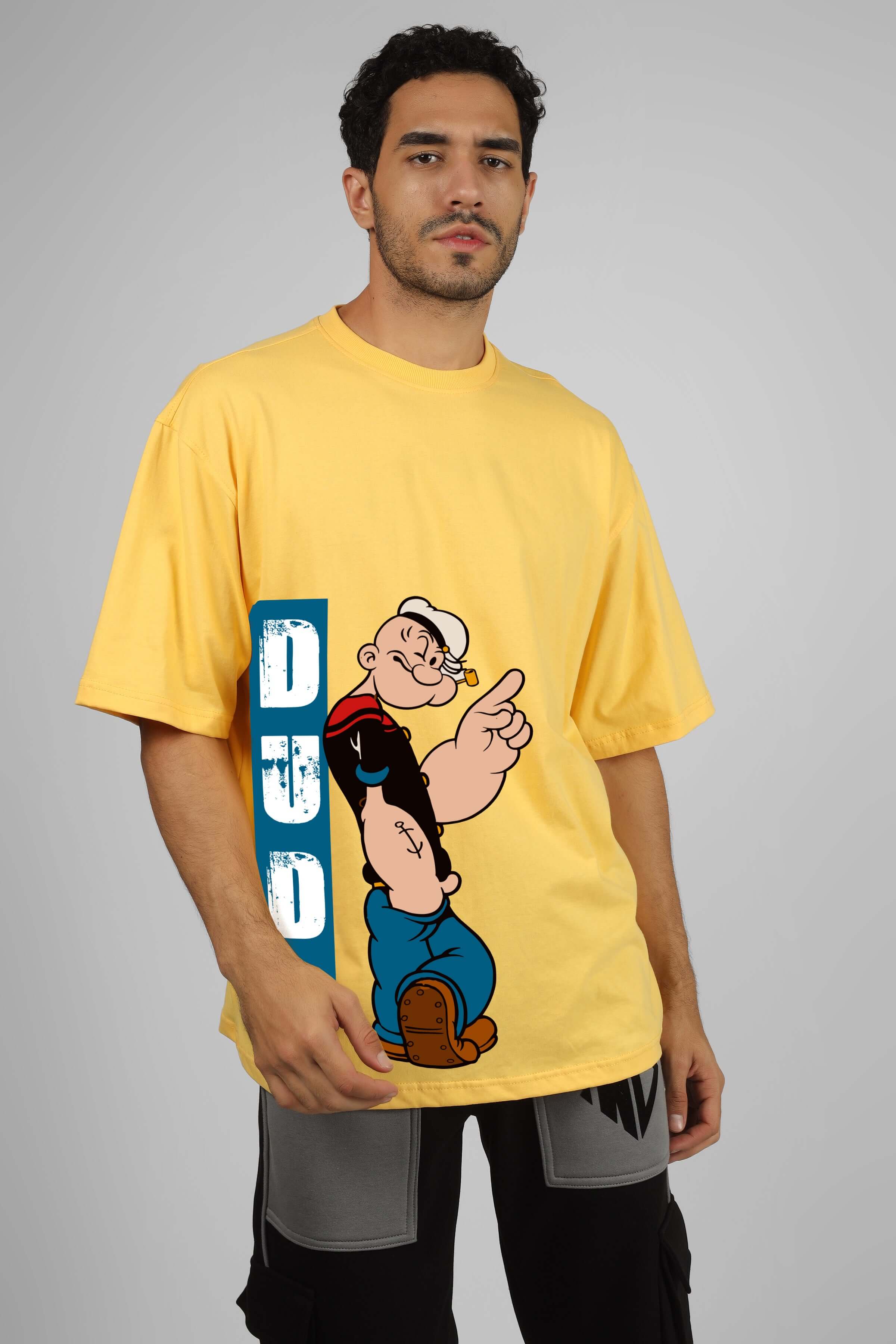 POPEYE OVER-SIZED T-SHIRT YELLOW featuring Popeye graphic design. Customize fit available under Size Tab for prepaid orders.