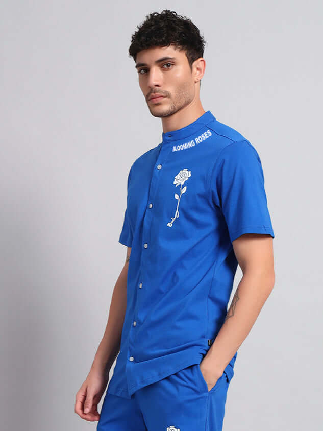 LIMBO regular fit blue shirt featuring premium cotton fabric, designed with a white rose embroidery. Ideal for stylish, comfortable wear.