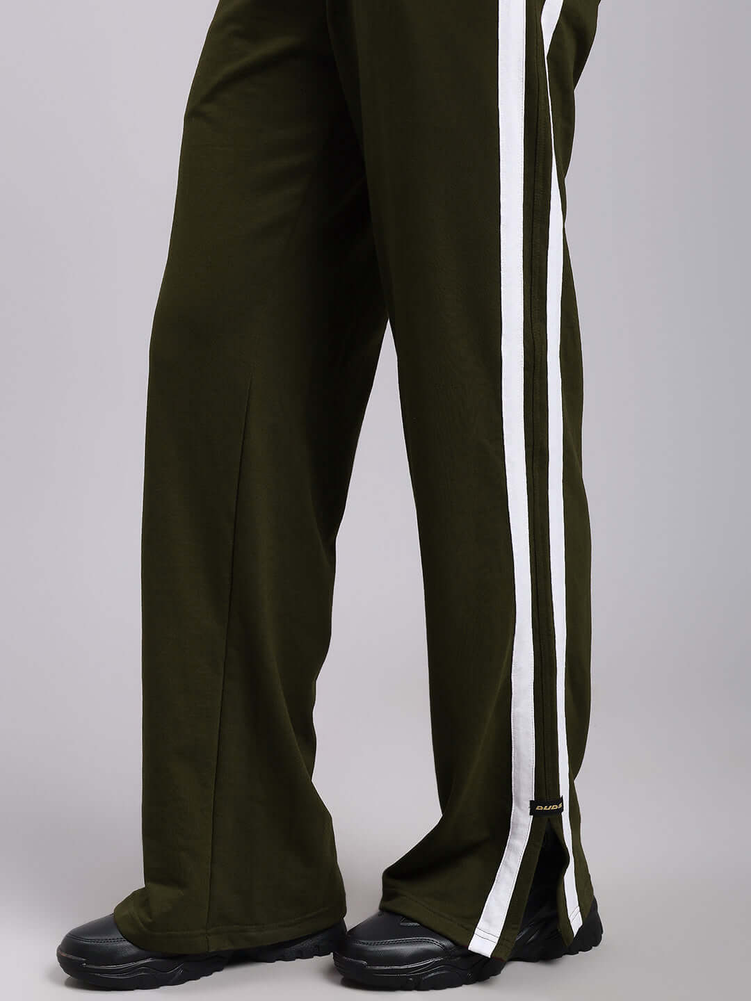 Women's olive green relaxed fit joggers with white side stripes by DUDS, designed for comfort and style. Available with a custom fit option.