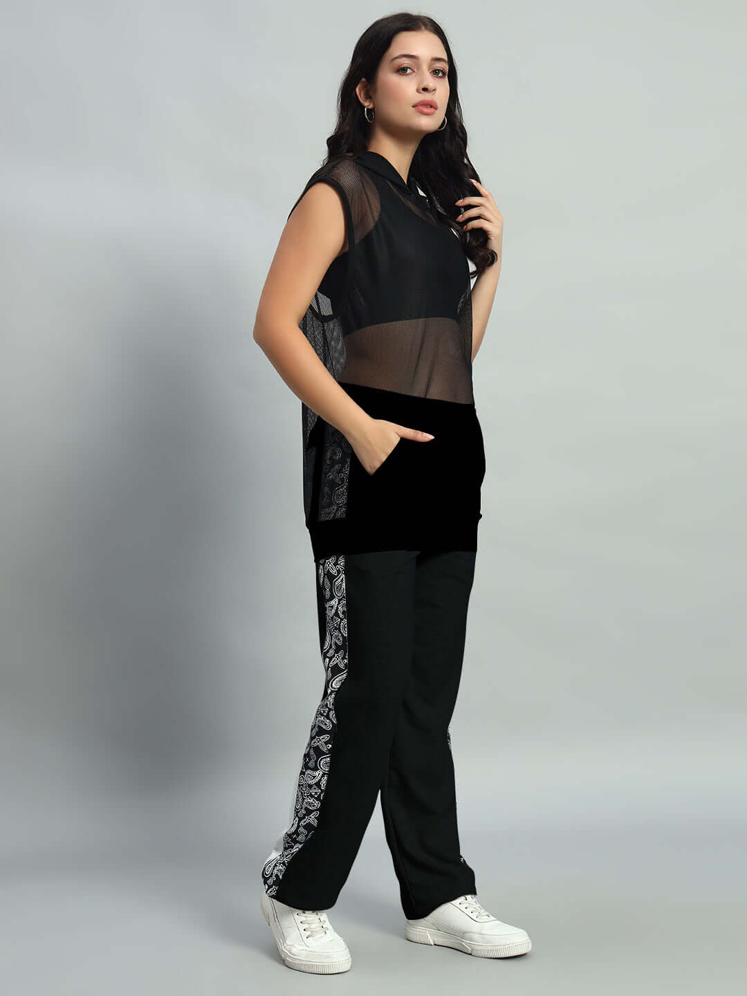 Model wearing WOMEN'S BOOGIE OVERSIZED CO-ORD SET BLACK featuring oversized t-shirt and relaxed-fit shorts.