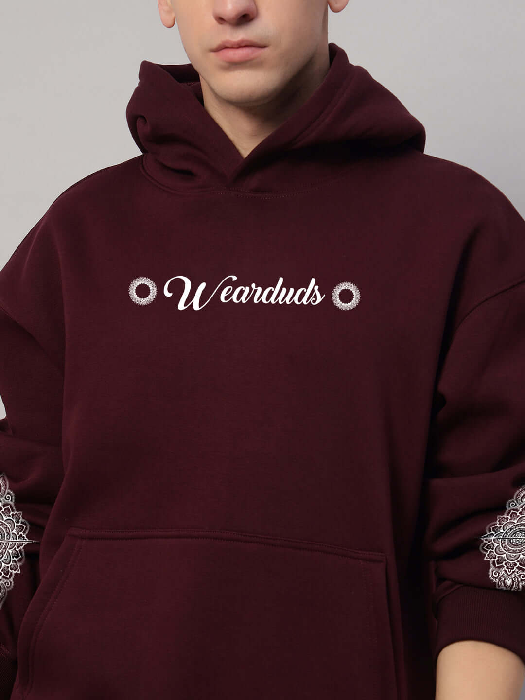 Yantra Fleece Hoodie in wine color, featuring cozy fleece fabric and stylish design, perfect for modern streetwear appeal.